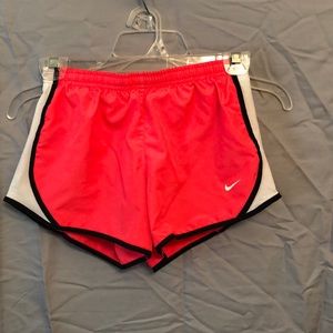 Pink Nike running shorts